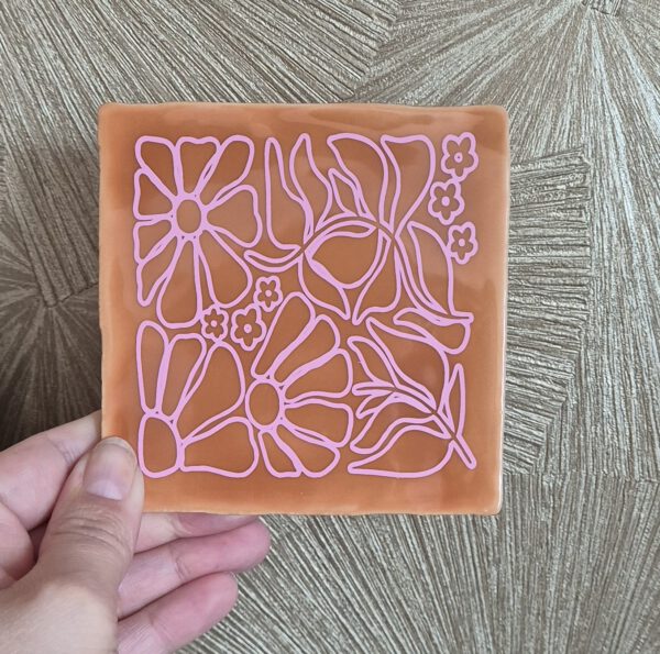 Tegeltje met tekst
Bloemenpatroon oranje