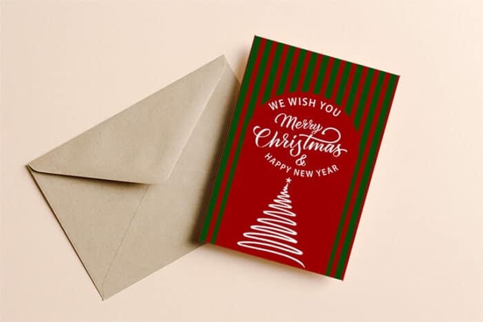 Kerstkaart met traditionele kerstkleuren, rood groen gestreept